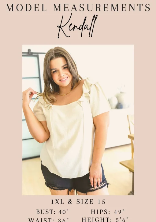 Fabled in Floral Draped Peplum Top in Blue