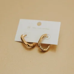 Flirty Fantasy Oval Hoop Earrings by Pretty Simple